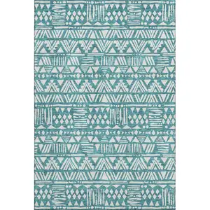 Photo of Teal And Ivory Southwestern Washable Area Rug With UV Protection