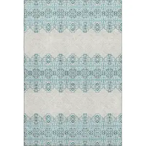 Photo of Teal And Ivory Southwestern Washable Area Rug With UV Protection