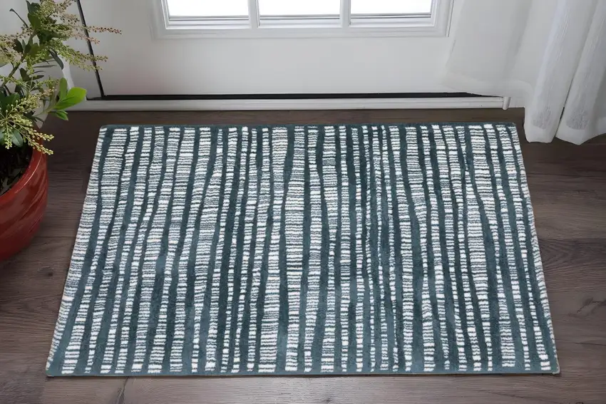 Teal And Ivory Striped Distressed Area Rug Photo 1