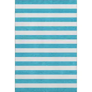 Photo of Teal And Ivory Striped Washable Area Rug With UV Protection