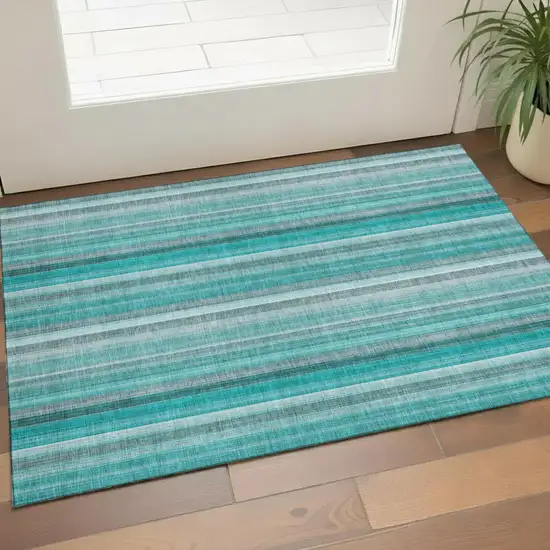 Teal And Ivory Striped Washable Area Rug With UV Protection Photo 1