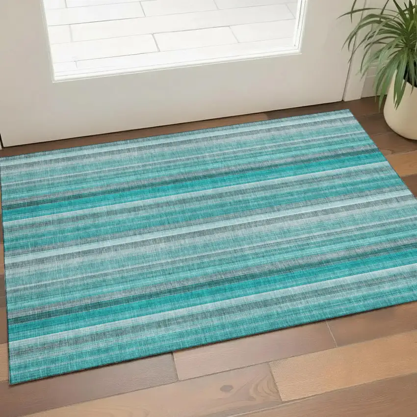 Teal And Ivory Striped Washable Area Rug With UV Protection Photo 1