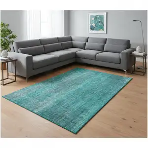 Photo of Teal And Ivory Striped Washable Area Rug With UV Protection
