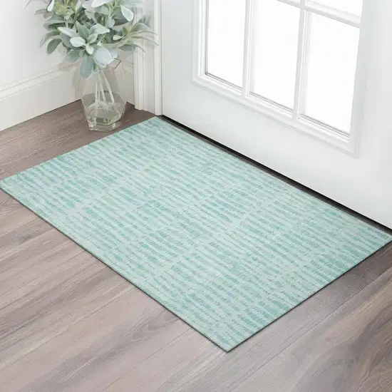 Teal And Ivory Striped Washable Area Rug With UV Protection Photo 1