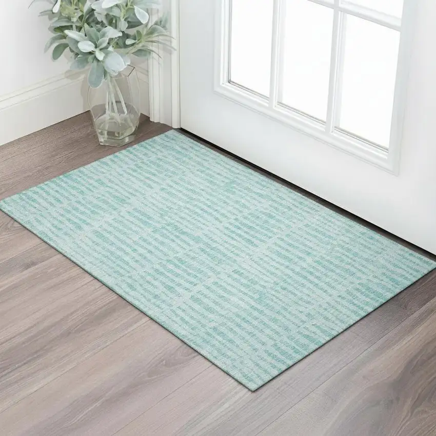 Teal And Ivory Striped Washable Area Rug With UV Protection Photo 1