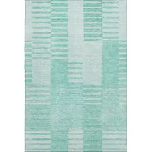 Photo of Teal And Ivory Striped Washable Area Rug With UV Protection