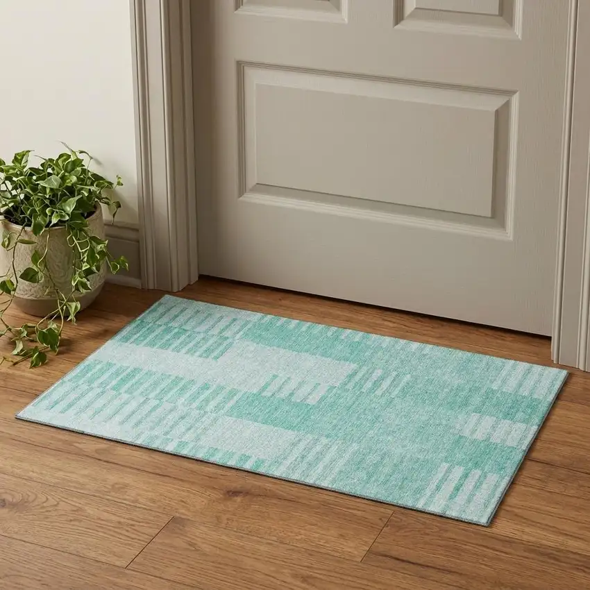 Teal And Ivory Striped Washable Area Rug With UV Protection Photo 1