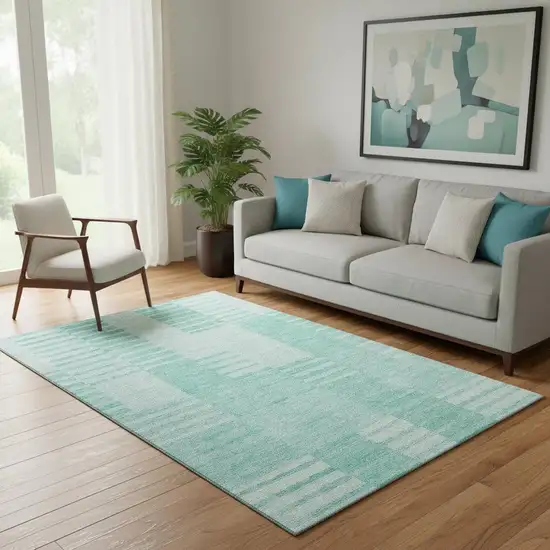 Teal And Ivory Striped Washable Area Rug With UV Protection Photo 1