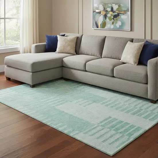 Teal And Ivory Striped Washable Area Rug With UV Protection Photo 1