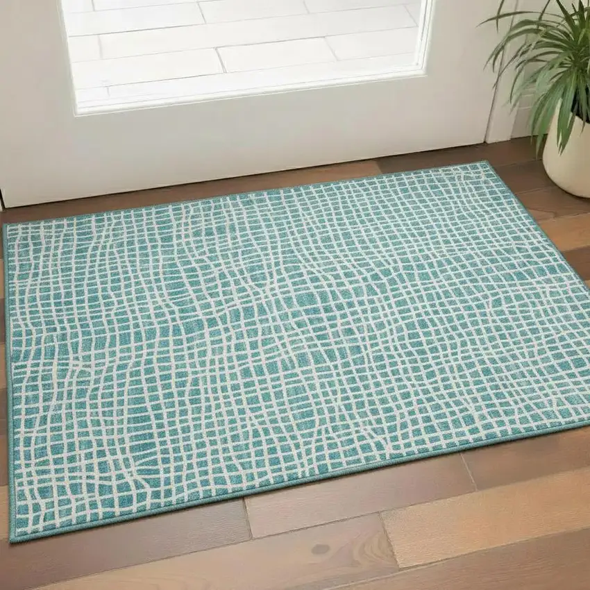 Teal And Ivory Striped Washable Area Rug With UV Protection Photo 1