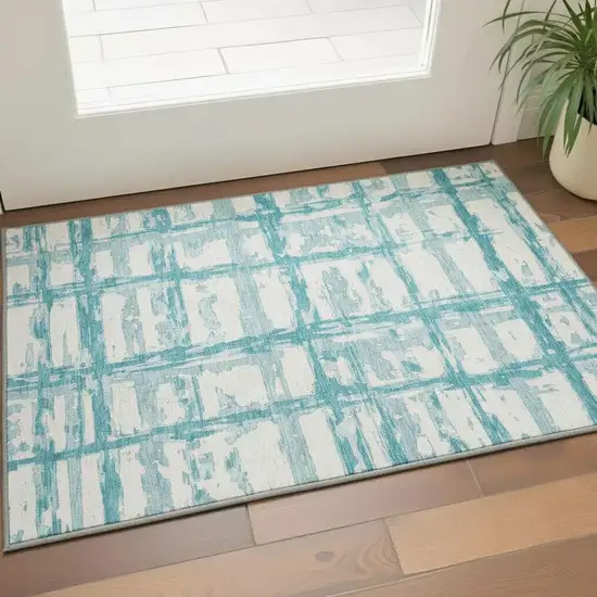 Teal And Ivory Striped Washable Area Rug With UV Protection Photo 2