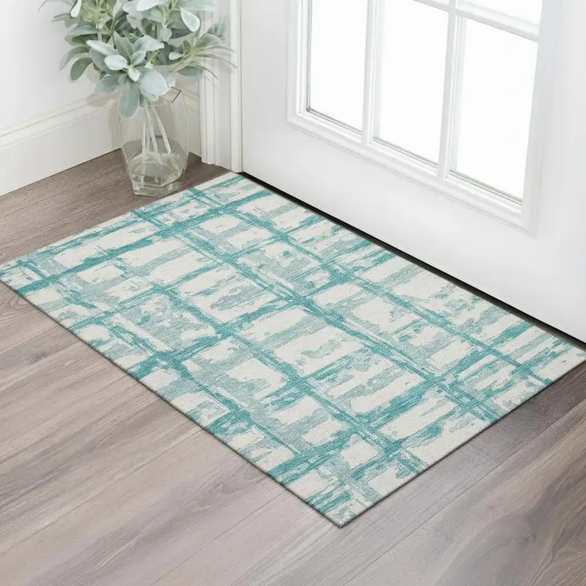 Teal And Ivory Striped Washable Area Rug With UV Protection Photo 1