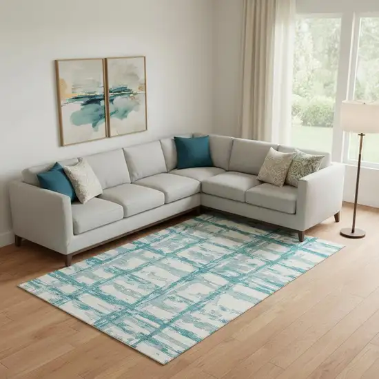 Teal And Ivory Striped Washable Area Rug With UV Protection Photo 1