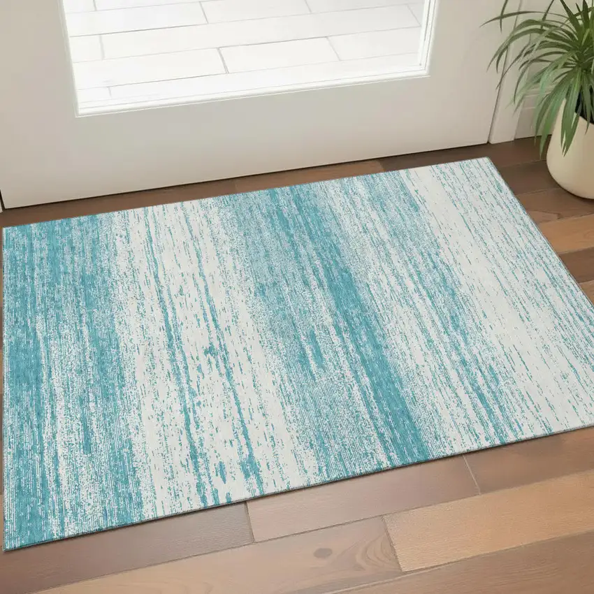 Teal And Ivory Striped Washable Area Rug With UV Protection Photo 1