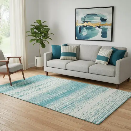 Teal And Ivory Striped Washable Area Rug With UV Protection Photo 1