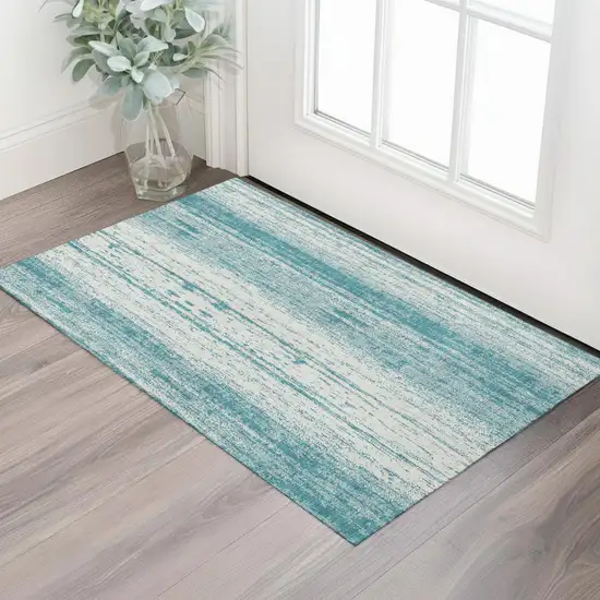 Teal And Ivory Striped Washable Area Rug With UV Protection Photo 1