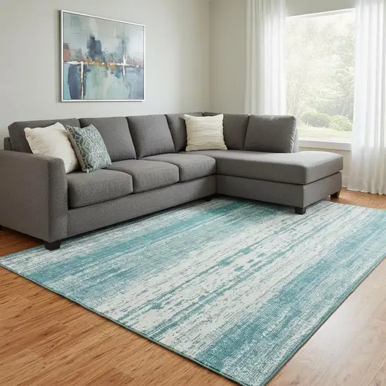 Teal And Ivory Striped Washable Area Rug With UV Protection Photo 1
