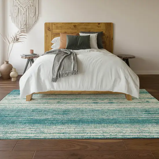 Teal And Ivory Striped Washable Area Rug With UV Protection Photo 6