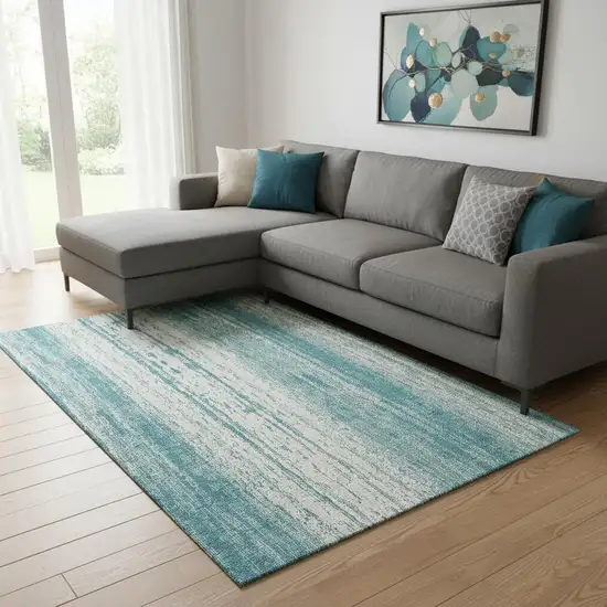 Teal And Ivory Striped Washable Area Rug With UV Protection Photo 1