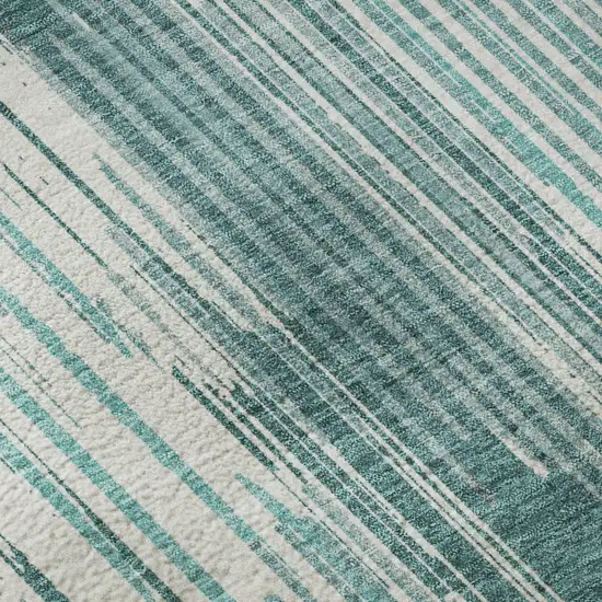 Teal And Ivory Striped Washable Area Rug With UV Protection Photo 1