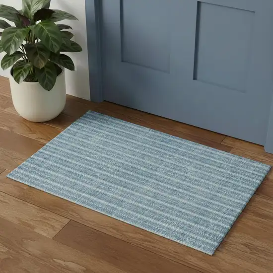 Teal And Ivory Striped Washable Area Rug With UV Protection Photo 1