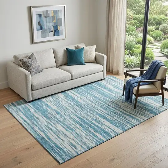 Teal And Ivory Striped Washable Area Rug With UV Protection Photo 1