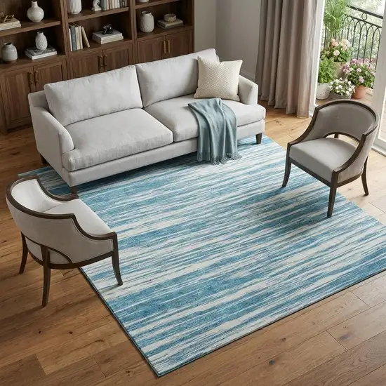 Teal And Ivory Striped Washable Area Rug With UV Protection Photo 1
