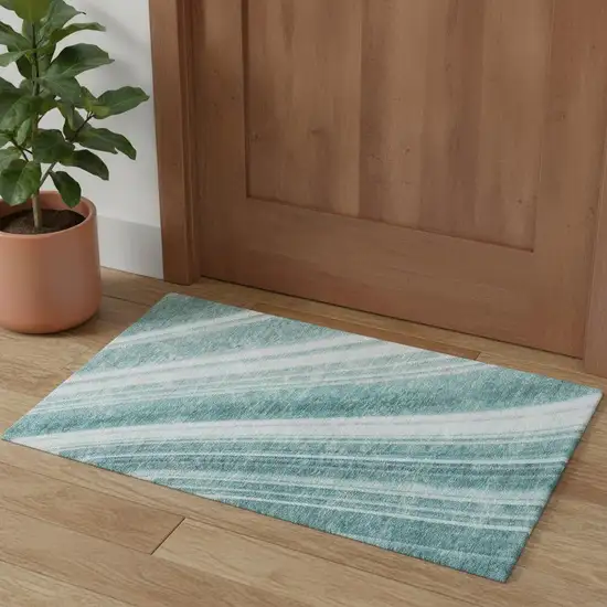 Teal And Ivory Striped Washable Area Rug With UV Protection Photo 1