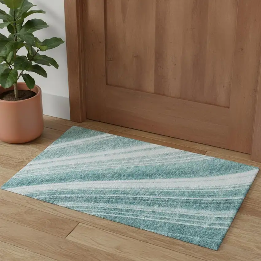 Teal And Ivory Striped Washable Area Rug With UV Protection Photo 1