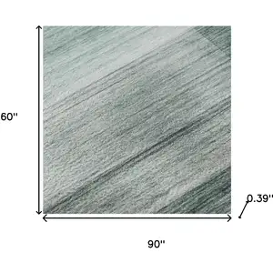 Photo of Teal And Ivory Striped Washable Area Rug With UV Protection