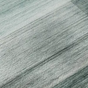 Photo of Teal And Ivory Striped Washable Area Rug With UV Protection