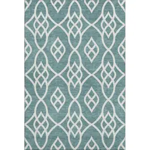 Photo of Teal And Ivory Trellis Washable Area Rug With UV Protection