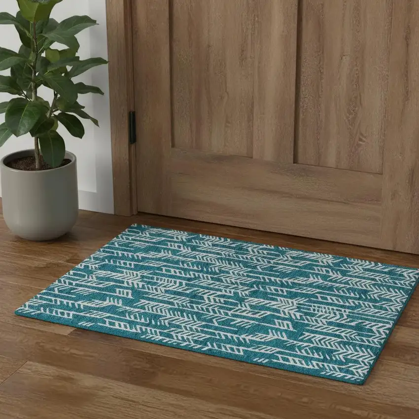 Teal And Ivory Tribal Washable Area Rug With UV Protection Photo 1
