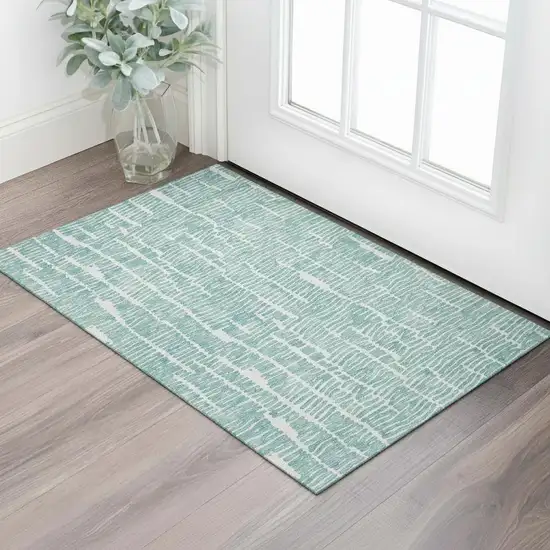 Teal And Ivory Vermicular Washable Area Rug With UV Protection Photo 1