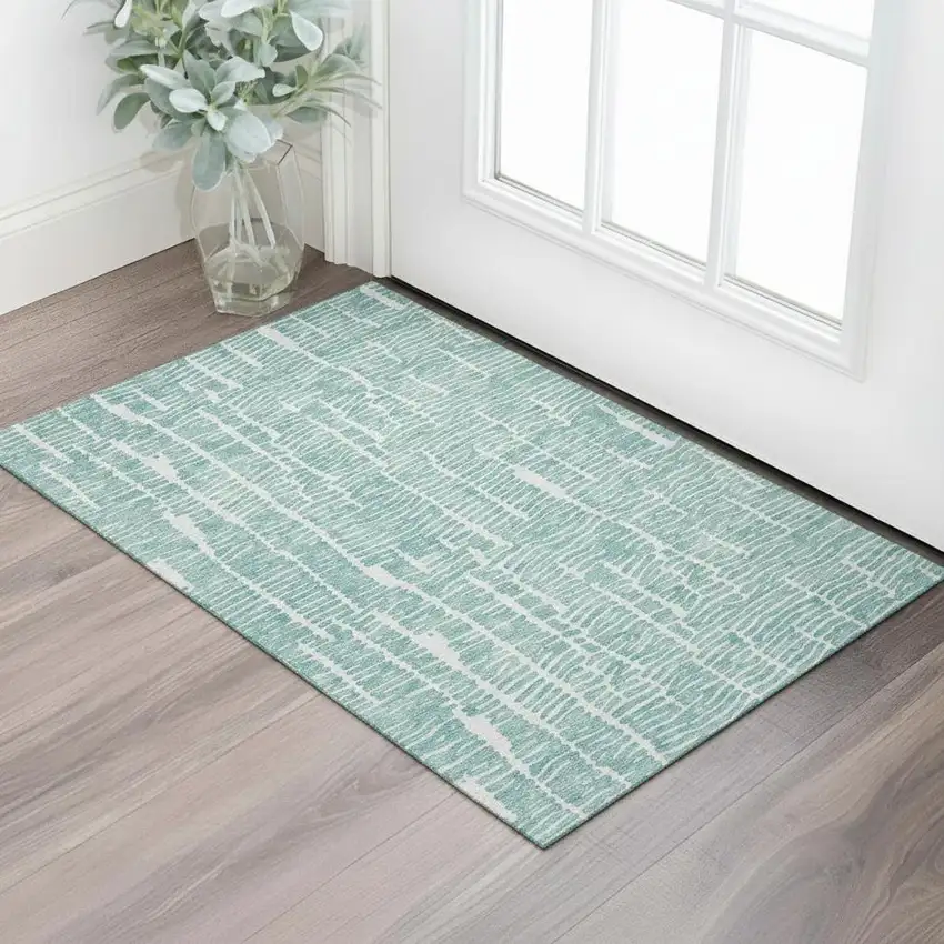 Teal And Ivory Vermicular Washable Area Rug With UV Protection Photo 1