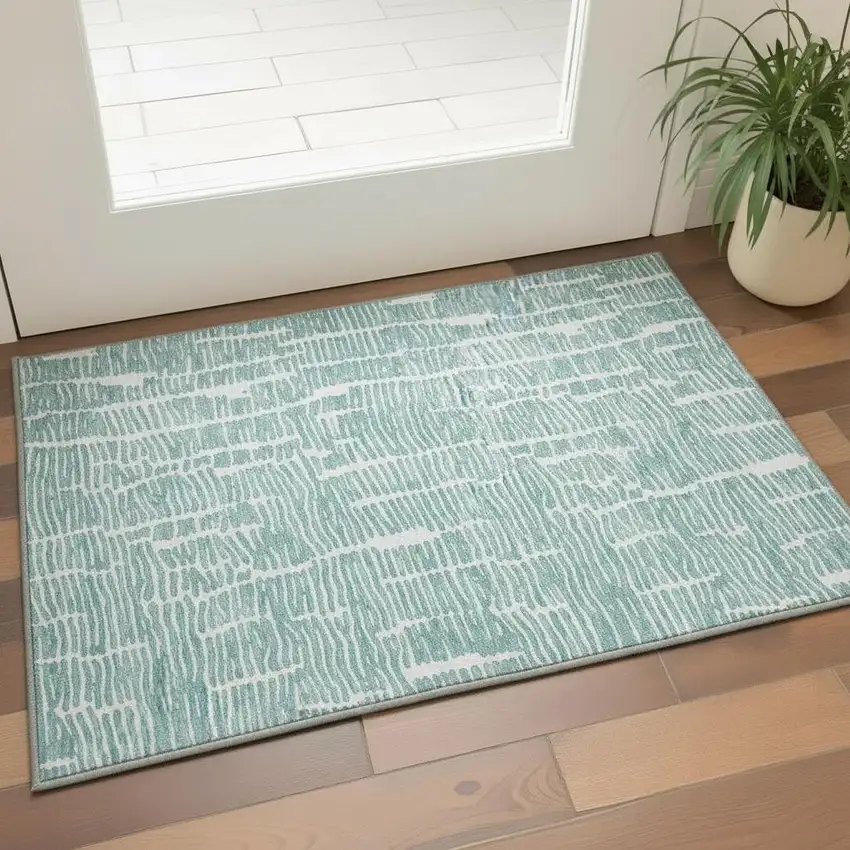 Teal And Ivory Vermicular Washable Area Rug With UV Protection Photo 2