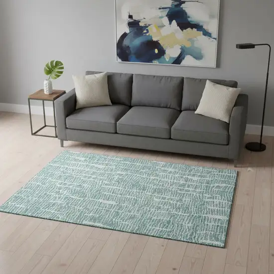 Teal And Ivory Vermicular Washable Area Rug With UV Protection Photo 2