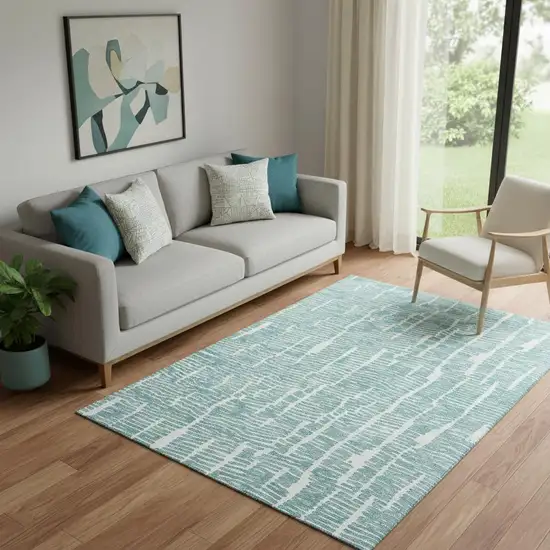 Teal And Ivory Vermicular Washable Area Rug With UV Protection Photo 1