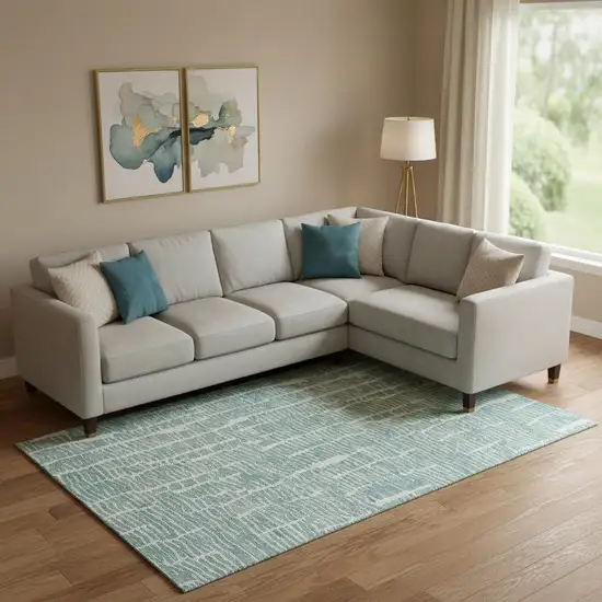 Teal And Ivory Vermicular Washable Area Rug With UV Protection Photo 1