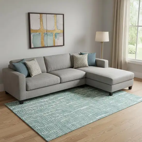 Teal And Ivory Vermicular Washable Area Rug With UV Protection Photo 1