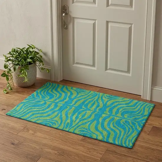 Teal And Lime Green Animal Print Washable Area Rug With UV Protection Photo 1