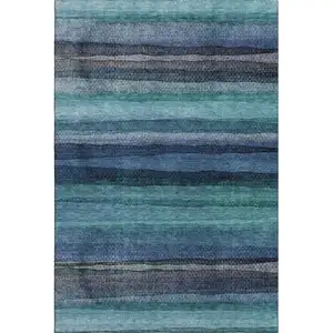 Photo of Teal And Navy Blue Striped Washable Area Rug With UV Protection