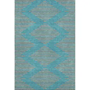 Photo of Teal And Peach Geometric Washable Area Rug With UV Protection