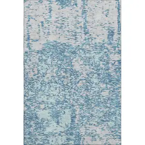 Photo of Teal And Silver Abstract Washable Area Rug With UV Protection