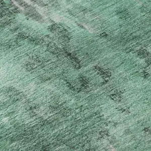 Photo of Teal And Silver Abstract Washable Area Rug With UV Protection