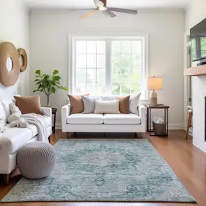 Photo of Teal And Silver Oriental Washable Area Rug With UV Protection