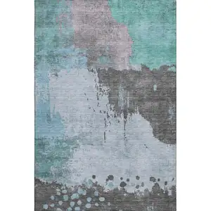 Photo of Teal And Taupe Abstract Washable Area Rug With UV Protection