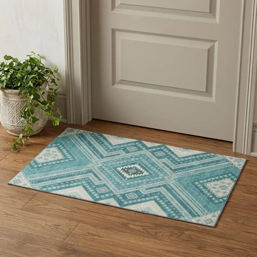 Teal Beige And Aqua Tribal Washable Area Rug With UV Protection Photo 1