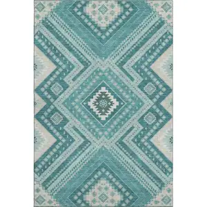 Photo of Teal Beige And Aqua Tribal Washable Area Rug With UV Protection