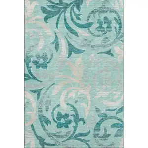 Photo of Teal Beige And Gray Floral Washable Area Rug With UV Protection